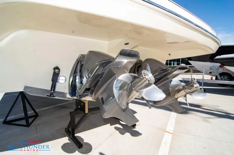 Slide: The Image of 2024 Invictus GT320 boat with dual outboard motors on display. - 15