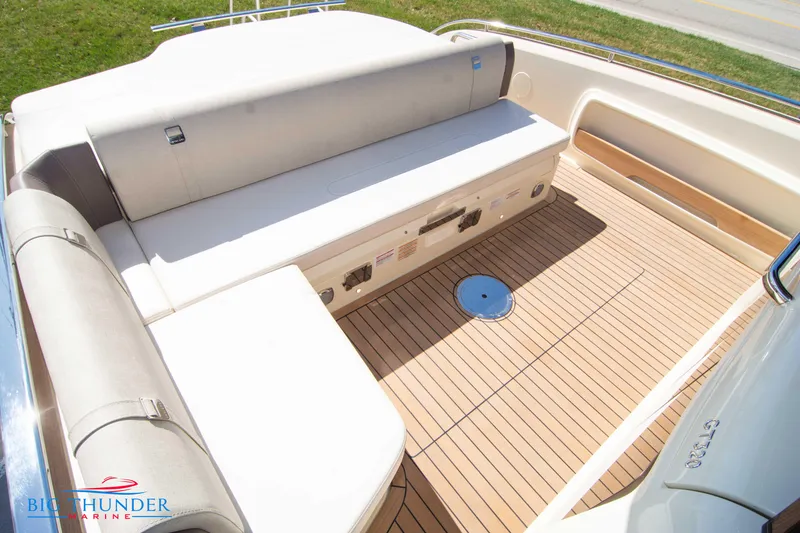 Slide: The Image of Invictus GT320 2024 boat with spacious seating and teak deck - 25
