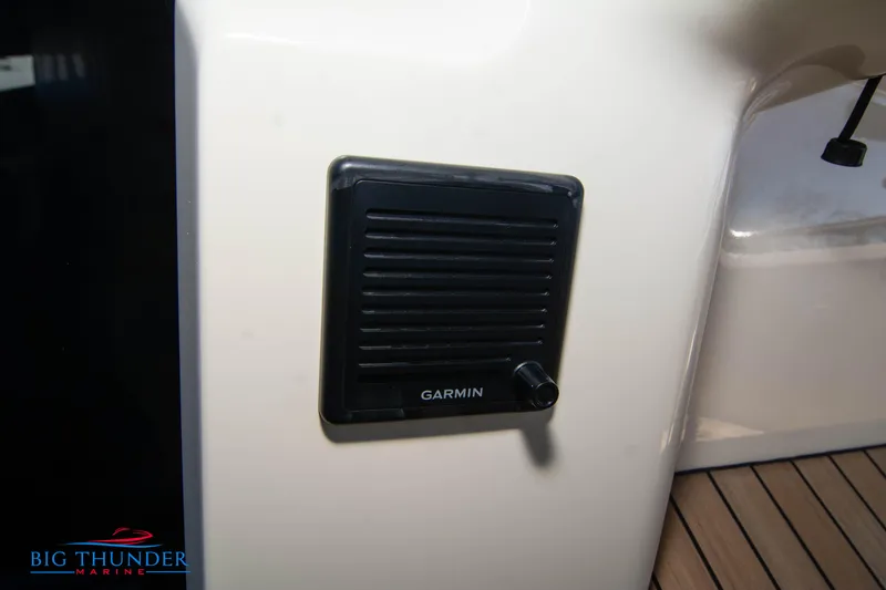 Slide: The Image of 2024 Invictus GT320 Garmin speaker on boat deck by Big Thunder Marine. - 43
