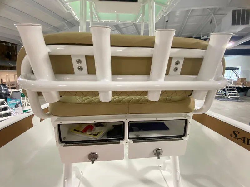 Slide: The Image of 2024 Savannah 210X boat with rod holders and storage compartments. - 9