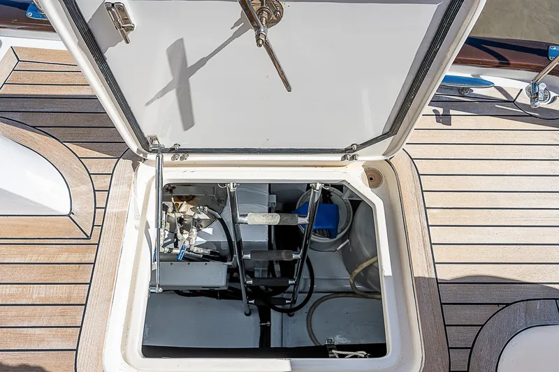 Slide: The Image of Open hatch of 2011 Hunt Yachts 52 showing mechanical components. - 19