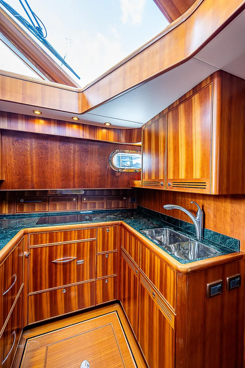 Slide: The Image of Luxurious wooden kitchen interior of 2011 Hunt Yachts 52 with skylight and modern amenities. - 34