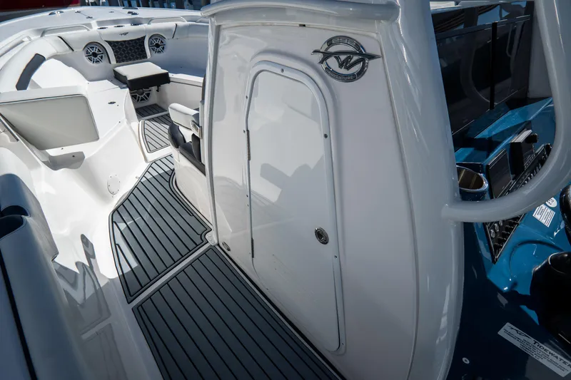 Slide: The Image of 2022 Tidewater 292CC Adventure boat interior with sleek design and modern features. - 37
