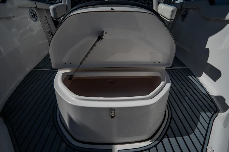 Slide: The Image of Open storage compartment on 2022 Tidewater 292CC Adventure boat deck. - 42