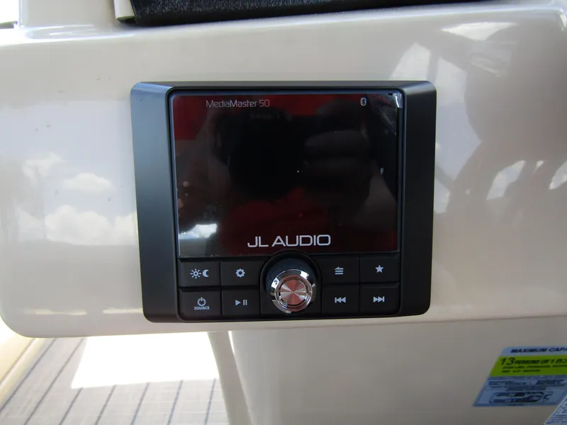 Slide: The Image of JL Audio MediaMaster 50 on 2024 Starcraft RX 23 Q DC boat. - 17