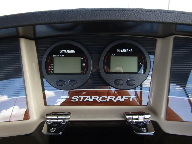 Slide: The Image of Dashboard of 2024 Starcraft RX 23 Q DC boat with Yamaha gauges. - 19