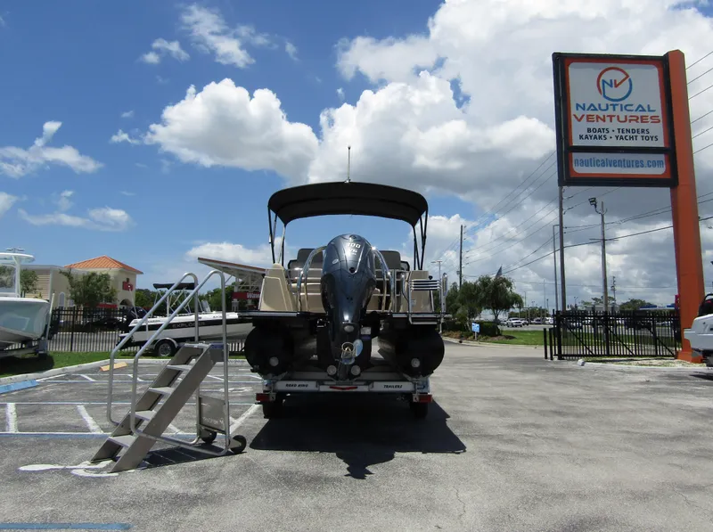 Slide: The Image of 2024 Starcraft RX 23 Q DC boat at Nautical Ventures dealership. - 2