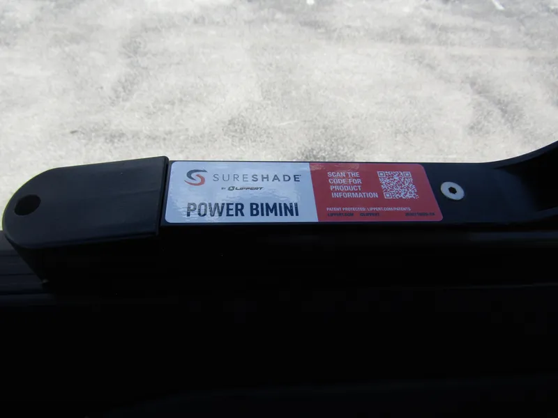 Slide: The Image of 2024 Starcraft RX 23 Q DC SureShade Power Bimini control panel. - 22