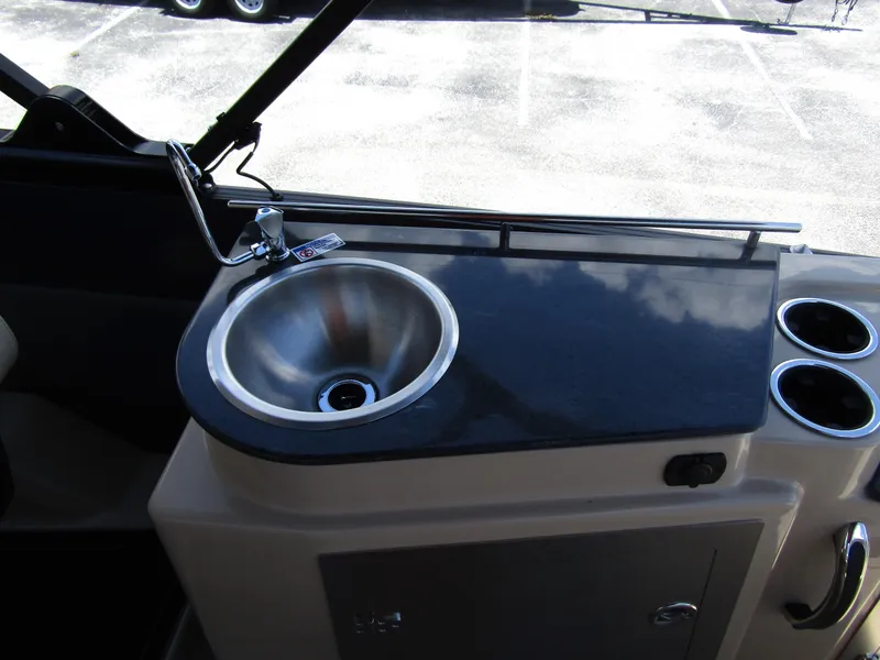 Slide: The Image of 2024 Starcraft RX 23 Q DC boat sink and countertop. - 26