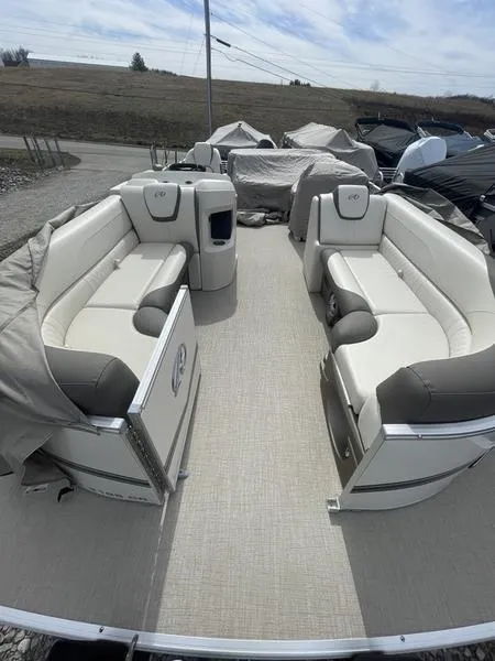 Slide: The Image of 2024 Avalon 2185 LSZ Cruise pontoon boat with spacious seating and modern design. - 1