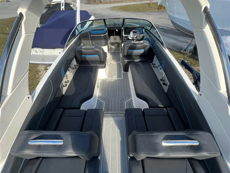 Slide: The Image of 2024 Regal LS6 Surf boat interior with sleek seating and modern design. - 15
