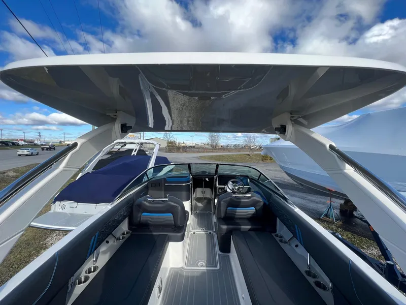 Slide: The Image of 2024 Regal LS6 Surf boat interior with sleek design and modern features. - 16