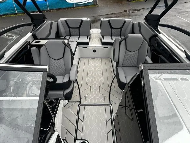 Slide: The Image of 2024 Yamaha Boats 255XD interior with modern seating and sleek design. - 10