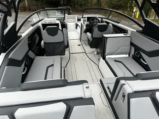Slide: The Image of 2024 Yamaha Boats 255XD interior with modern seating and sleek design. - 4