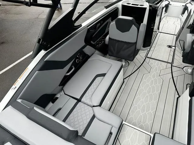 Slide: The Image of 2024 Yamaha Boats 255XD interior with modern seating and sleek design. - 6