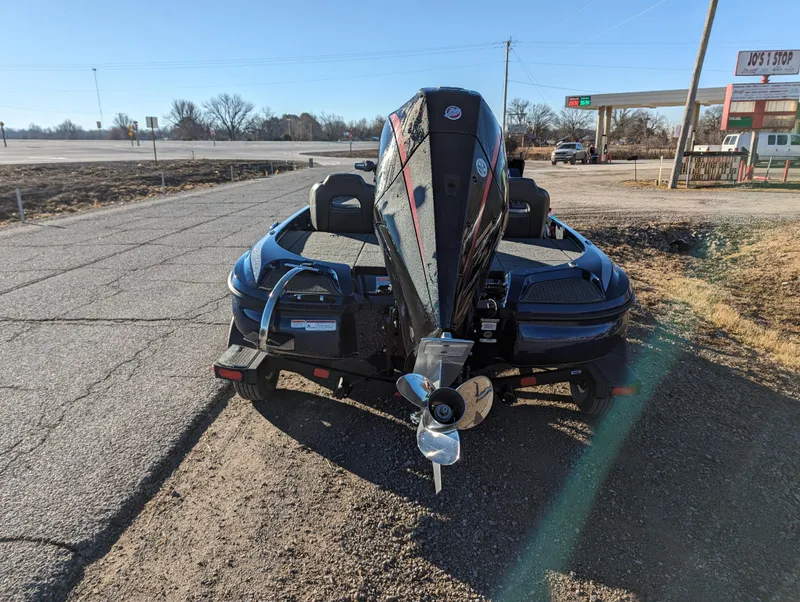 Slide: The Image of 2024 Nitro Z18 Pro boat on trailer, parked roadside. - 4