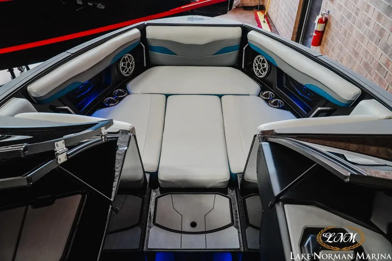 Slide: The Image of 2022 Axis T250 boat interior with spacious seating and modern design at Lake Norman Marina. - 11