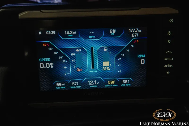 Slide: The Image of Garmin display on 2022 Axis T250 boat showing speed, RPM, and other metrics. - 12