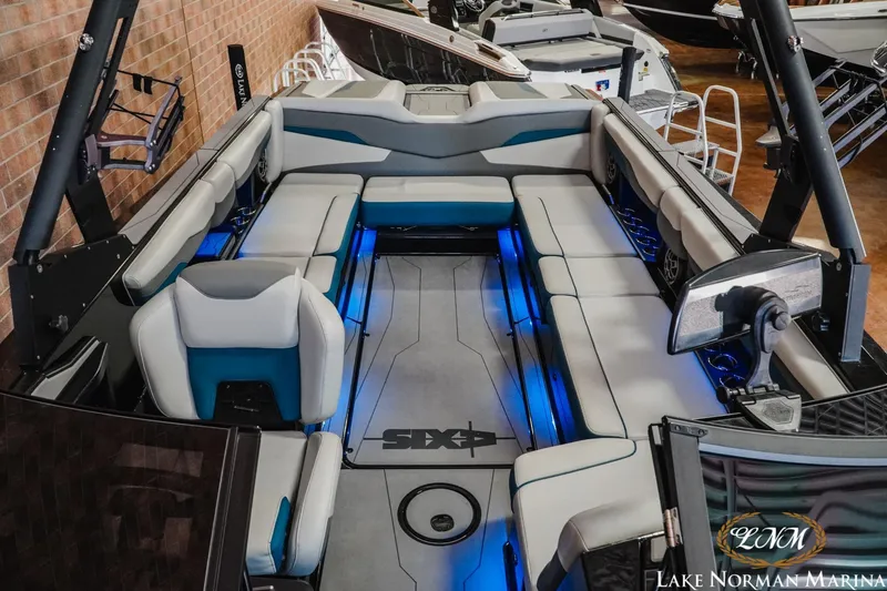 Slide: The Image of 2022 Axis T250 boat interior with blue LED lighting at Lake Norman Marina. - 14