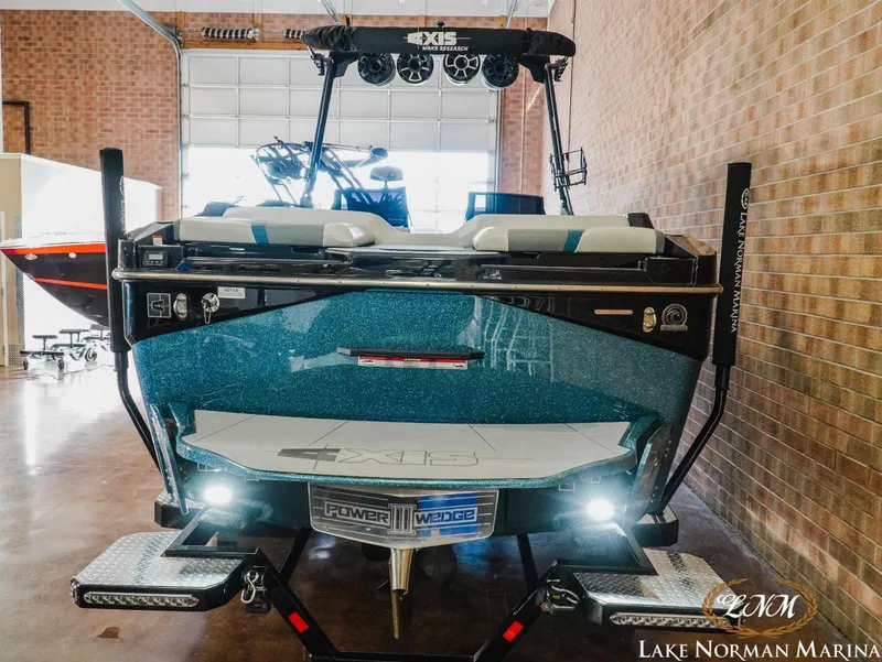 Slide: The Image of 2022 Axis T250 boat at Lake Norman Marina, rear view in showroom. - 3