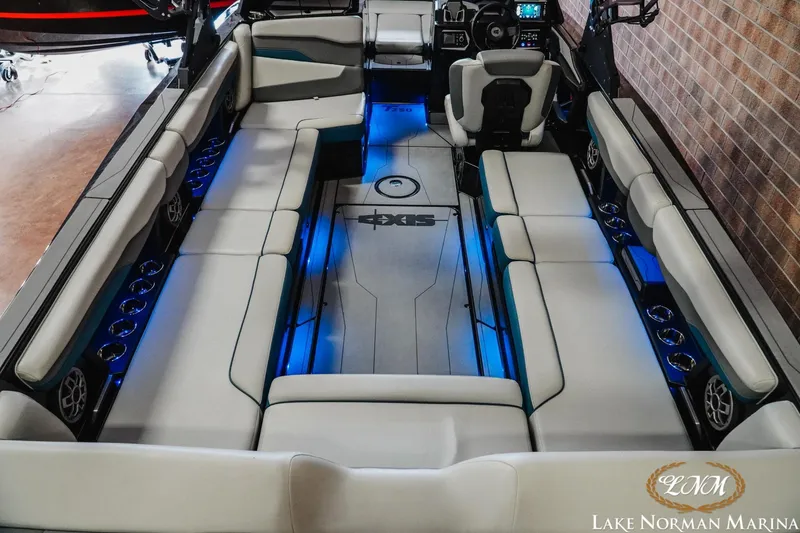 Slide: The Image of 2022 Axis T250 boat interior with LED lighting and spacious seating at Lake Norman Marina. - 7