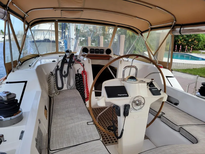 Slide: The Image of 2003 Taswell 58 yacht cockpit with steering wheel and navigation equipment. - 12