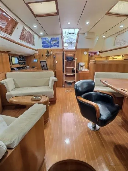 Slide: The Image of Luxurious interior of a 2003 Taswell 58 yacht with elegant wood finishes. - 13