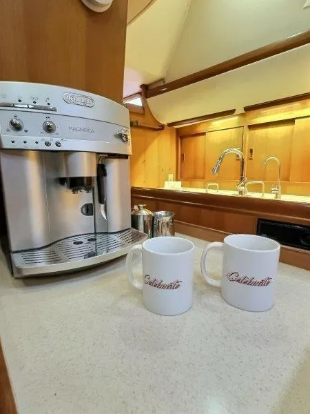 Slide: The Image of Coffee maker and mugs in the kitchen of a 2003 Taswell 58 yacht. - 22