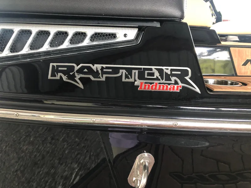 Slide: The Image of 2023 Moomba Makai boat with Raptor Indmar engine branding. - 20