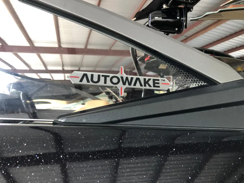 Slide: The Image of 2023 Moomba Makai with AutoWake technology in a garage setting. - 22