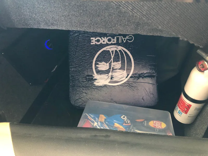 Slide: The Image of 2023 Moomba Makai storage area with fire extinguisher and snacks. - 33