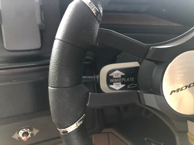 Slide: The Image of 2023 Moomba Makai steering wheel with wakeplate control. - 48