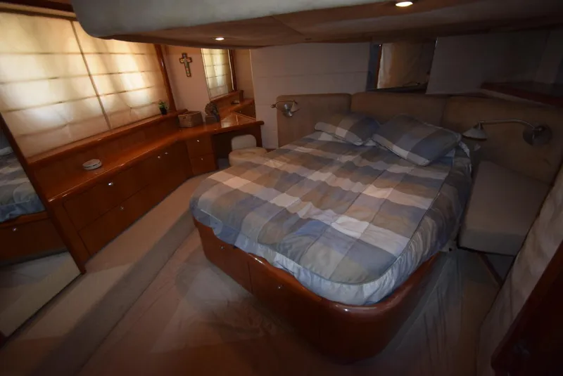 Slide: The Image of Luxurious bedroom interior of 2005 Sunseeker Manhattan 50 yacht with double bed. - 12