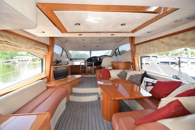 Slide: The Image of Luxurious interior of 2005 Sunseeker Manhattan 50 yacht with plush seating and wooden accents. - 3