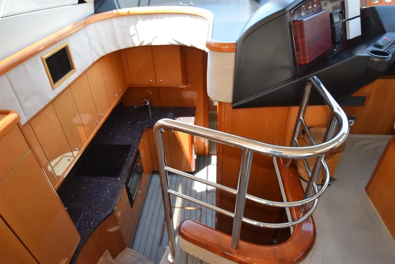 Slide: The Image of Interior of 2005 Sunseeker Manhattan 50 yacht with kitchen and staircase. - 7