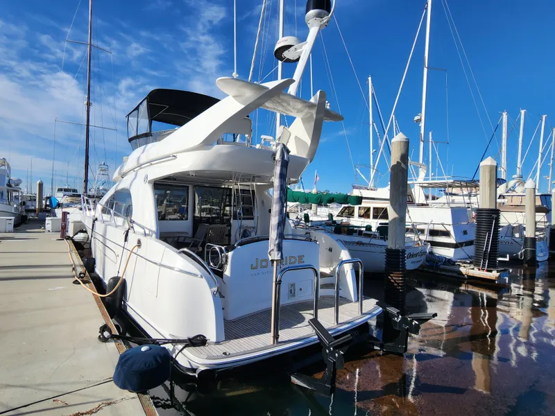 Slide: The Image of 2007 Ocean Alexander Veloce yacht docked at marina under clear blue sky. - 1