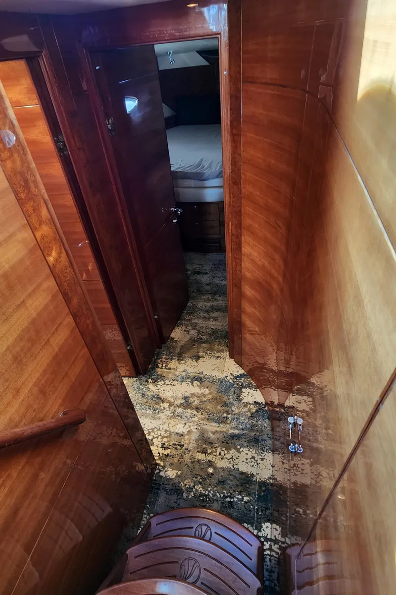 Slide: The Image of Luxurious wooden interior of 2007 Ocean Alexander Veloce yacht hallway. - 23