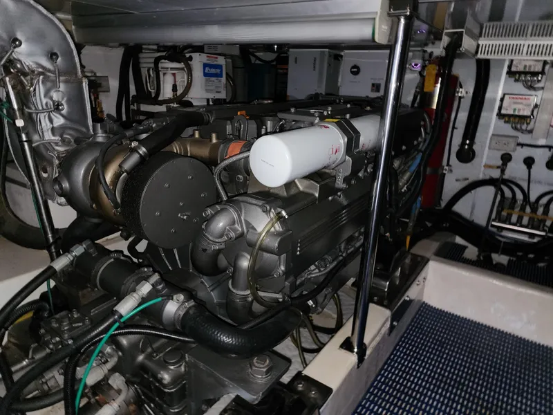 Slide: The Image of Engine room of 2007 Ocean Alexander Veloce yacht, showcasing complex machinery and components. - 35