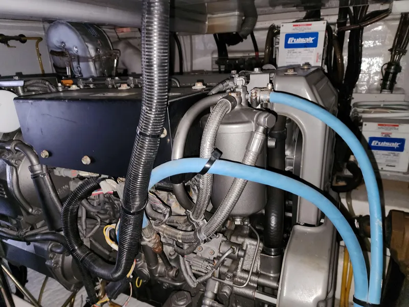 Slide: The Image of Engine room of 2007 Ocean Alexander Veloce yacht, showcasing complex machinery and wiring. - 37