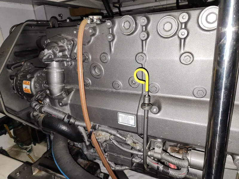 Slide: The Image of Engine compartment of a 2007 Ocean Alexander Veloce yacht, showcasing detailed mechanical components. - 42