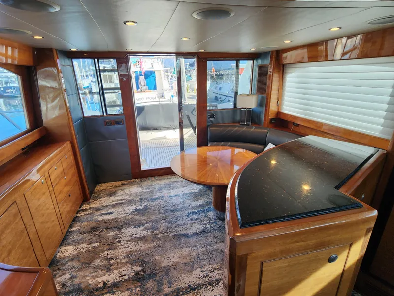 Slide: The Image of Luxurious interior of 2007 Ocean Alexander Veloce yacht with elegant wood finishes and modern design. - 7