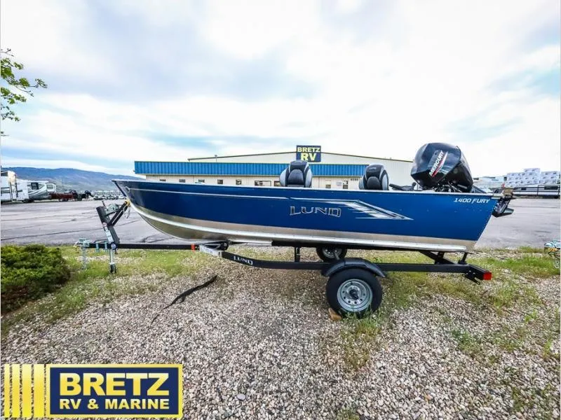 Slide: The Image of 2024 Fury 1400 Tiller boat on trailer at Bretz RV & Marine dealership. - 4