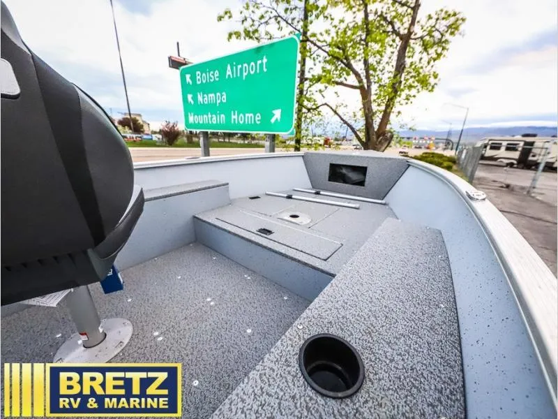 Slide: The Image of 2024 Fury 1400 Tiller boat interior near Boise Airport sign, Bretz RV & Marine. - 9