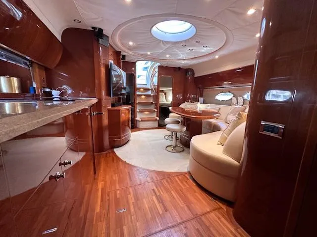 Slide: The Image of Luxurious interior of 2006 Princess 58v yacht with elegant wood finishes and modern amenities. - 39