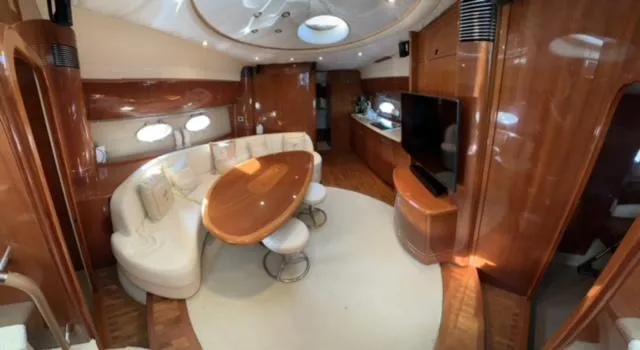Slide: The Image of Luxurious interior of 2006 Princess 58v yacht with elegant wood finishes and modern amenities. - 41