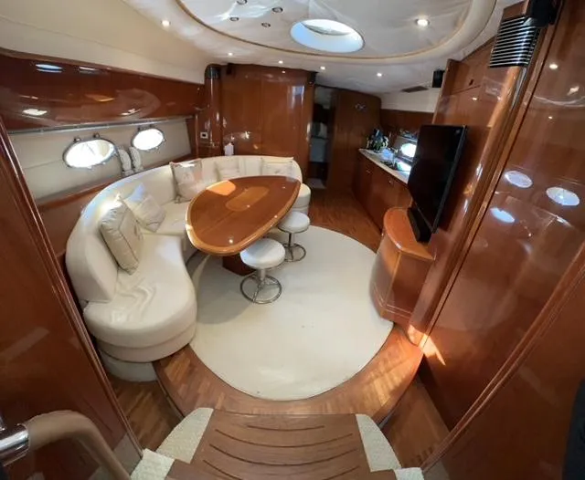 Slide: The Image of Luxurious interior of 2006 Princess 58v yacht with elegant seating and modern amenities. - 42