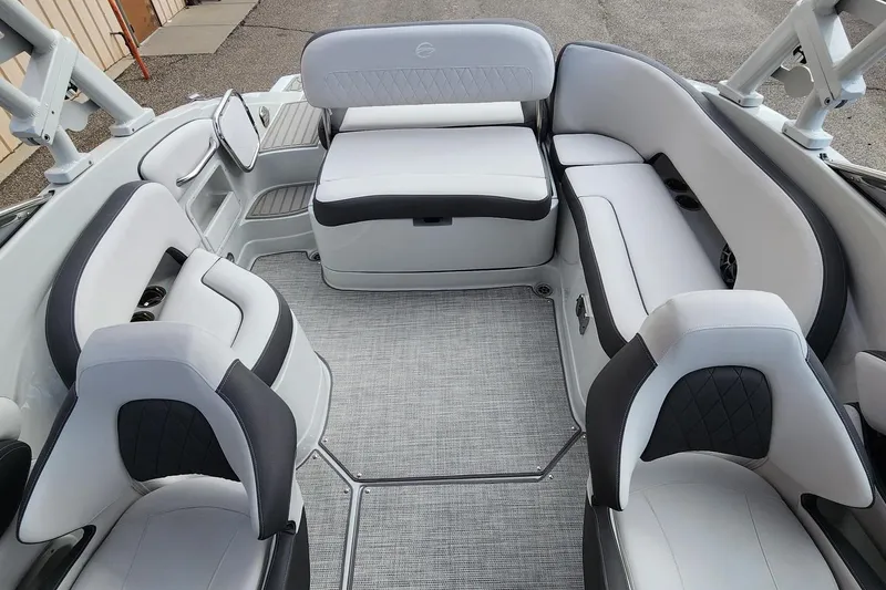 Slide: The Image of 2024 Crownline E235 boat interior with luxurious seating and modern design. - 5