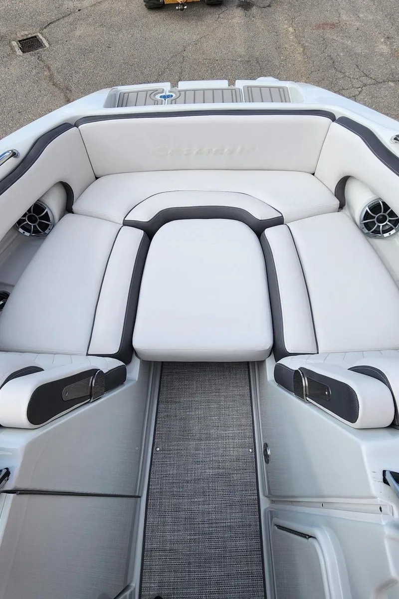 Slide: The Image of 2024 Crownline E235 boat interior with luxurious seating and modern design. - 9