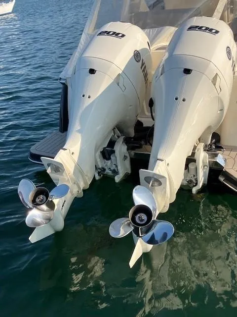 Slide: The Image of 2022 Scout 277 Dorado with twin Yamaha 200 outboard motors on water. - 4