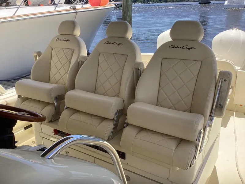 Slide: The Image of 2016 Chris-Craft 34 Catalina boat with luxurious beige leather seats. - 10